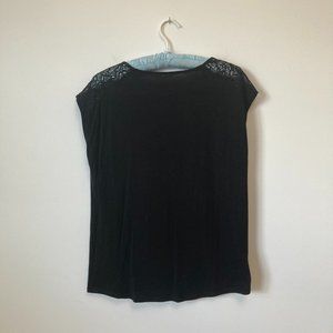 Sleeveless black top